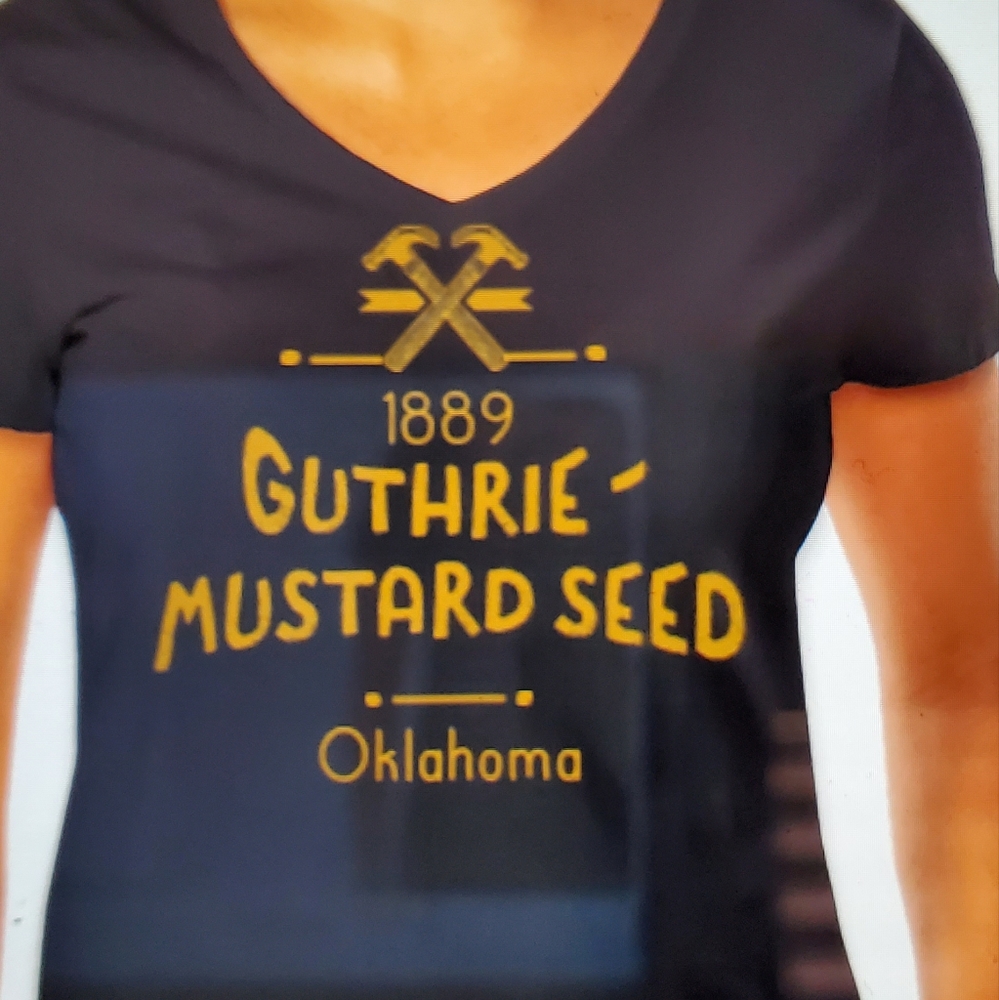 Women's V-neck T-Shirts Black w Old Gold writing.